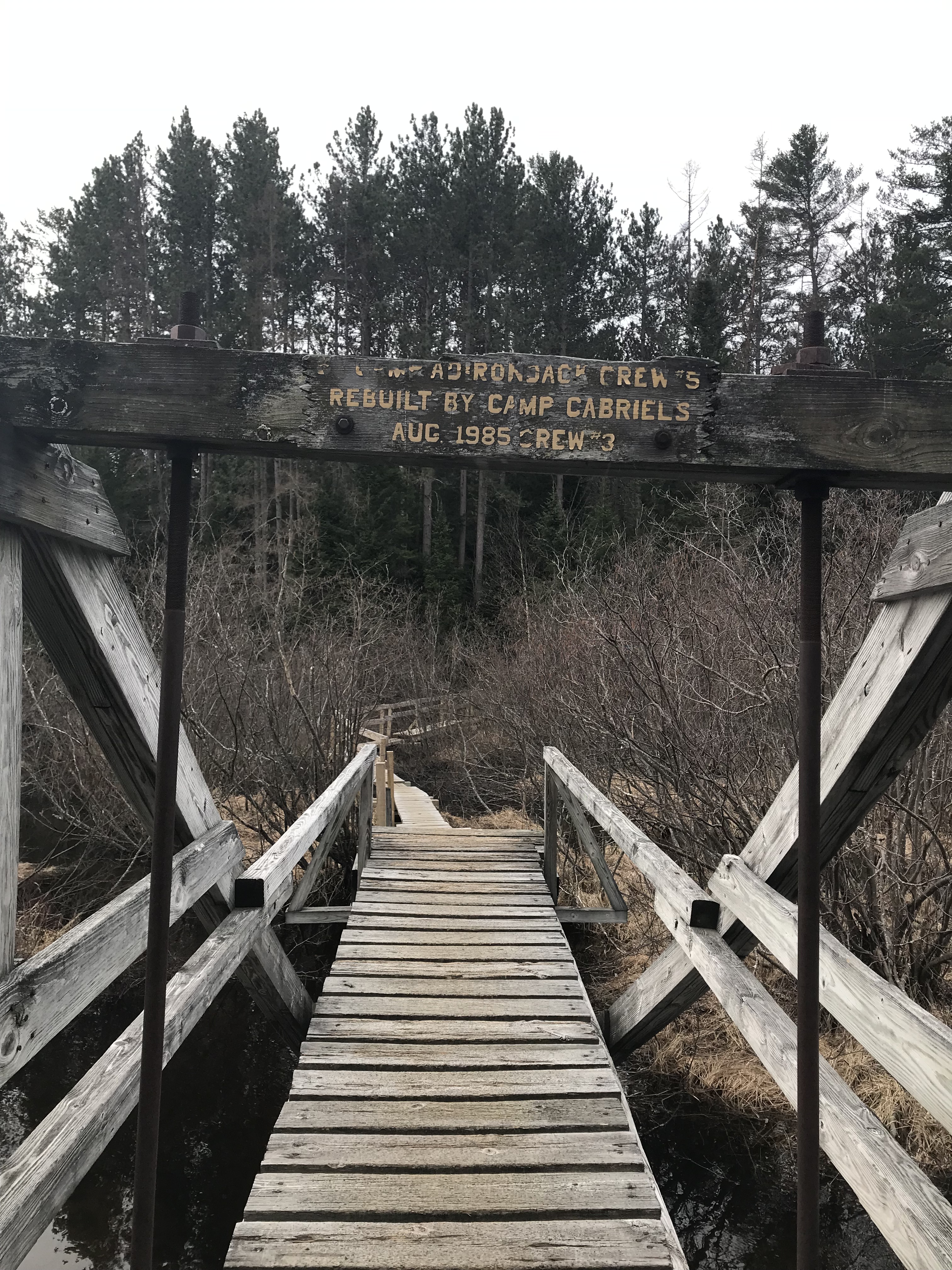 Sign on bridge by Camp Cabriels