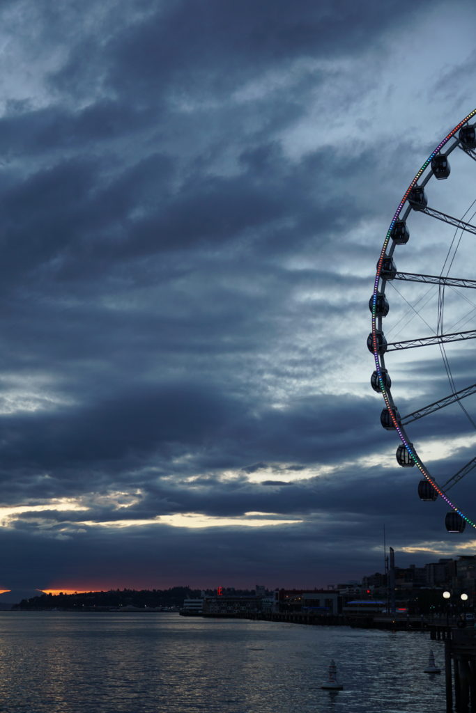Ferris wheel in Seattle on the pier during sunset